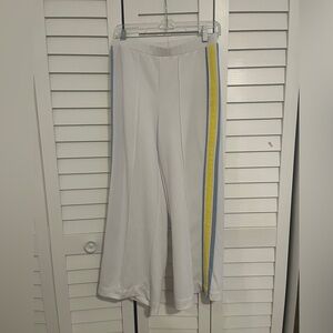 Yellow blue and white track pants flared